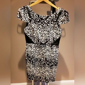 Ladies black and white dress with faux leather